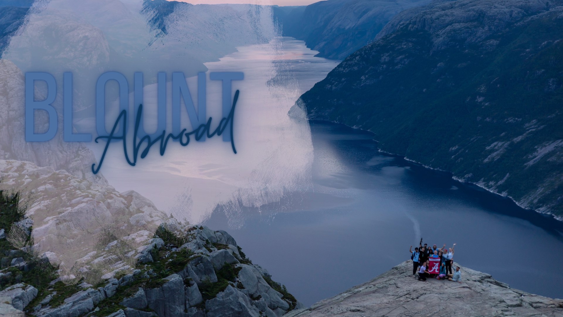 Blount students in Norway on a cliff overlooking a mountain range and fjord. Text reads "Blount Abroad."
